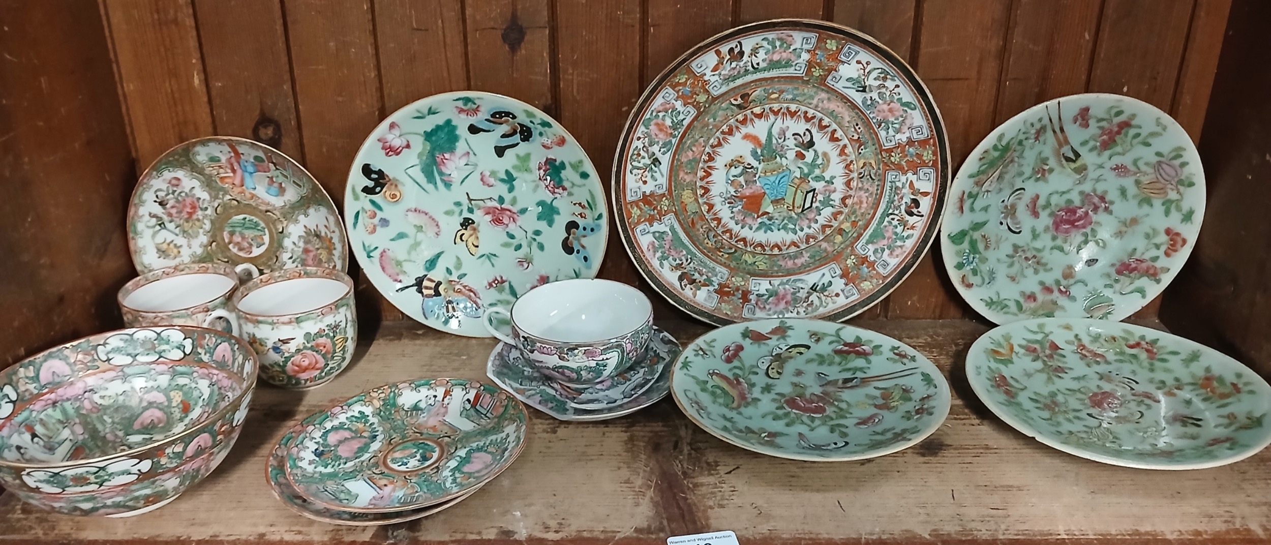 Shelf lot of Famille Rose and Famille Verte pottery