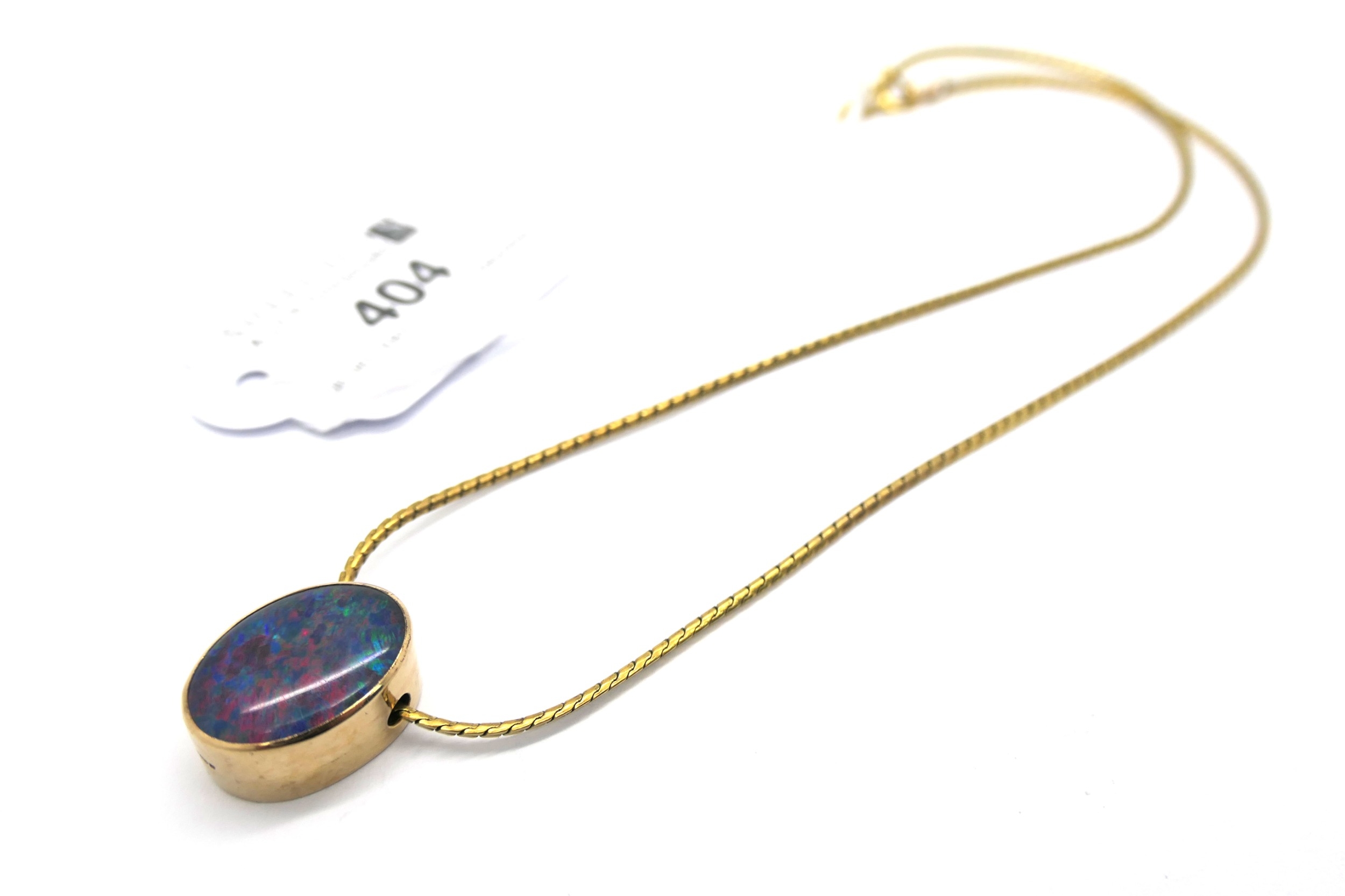 9ct gold black opal sliding pendant on a smooth-link chain