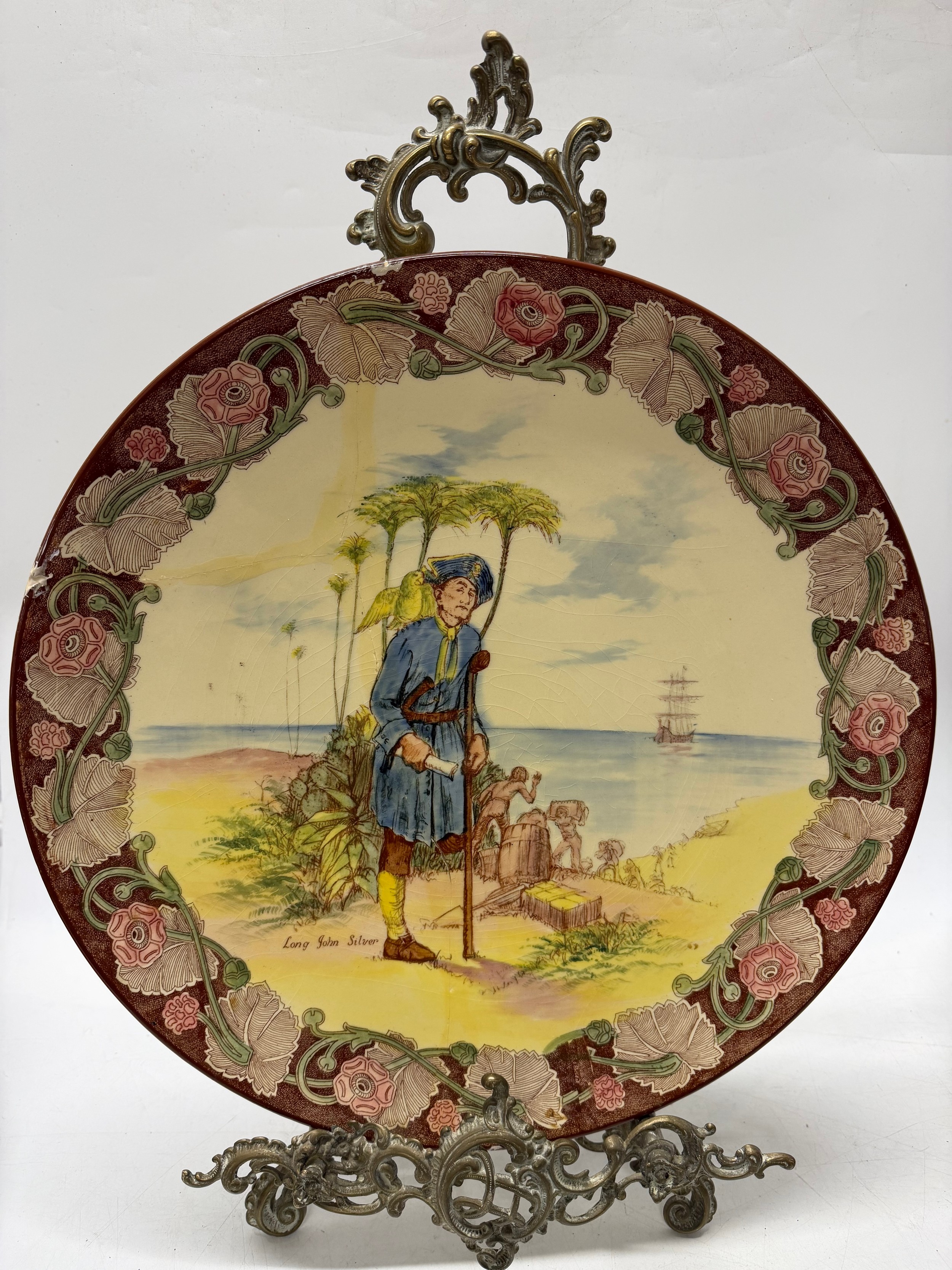 Royal Doulton Long John Silver ceramic charger with pirate figure in broad hat and coat