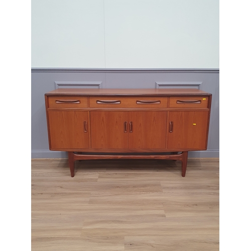 G-Plan teak sideboard with four drawers above four cupboard doors