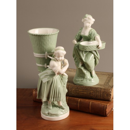 Late 19th-century Minton celadon-glazed figural spill vase with basket-carrying girl and companion figure