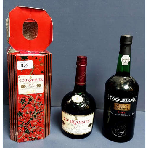 Boxed bottle of Courvoisier cognac beside a bottle of Cockburn’s Special Reserve port