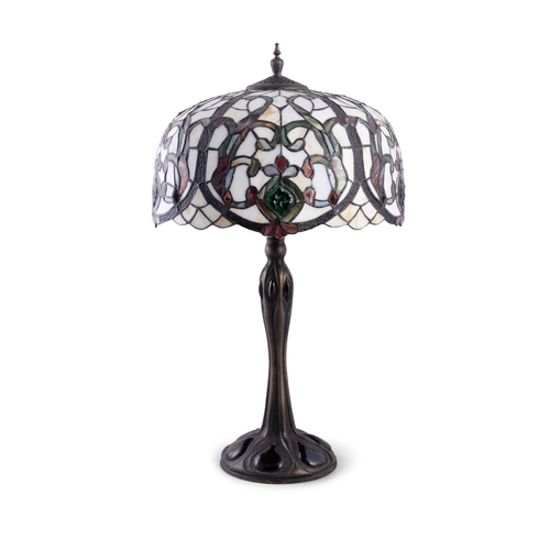 Tiffany-style table lamp with stained-glass mosaic shade on a tapering column base