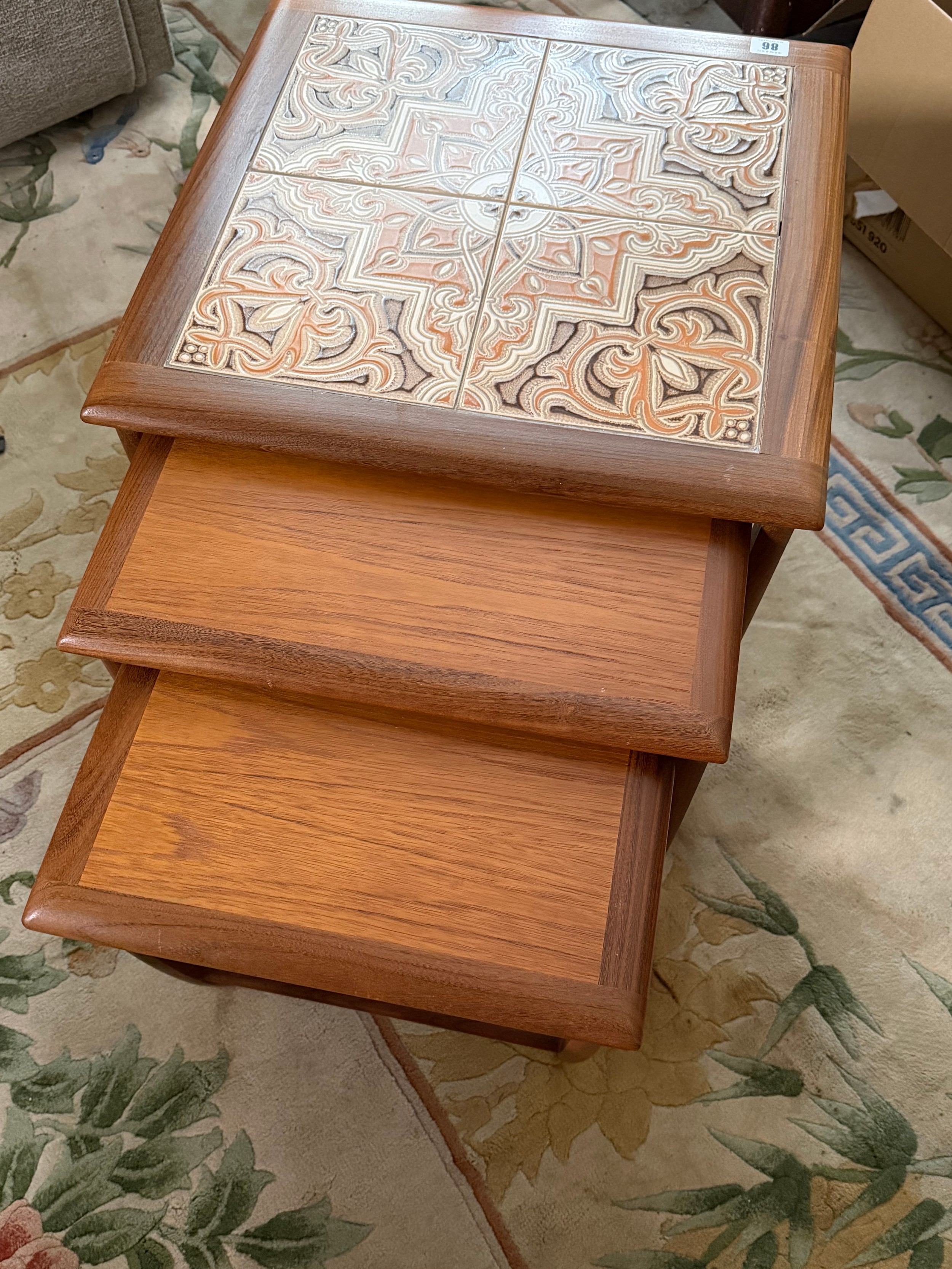 Nest of three mid-century G Plan Astro teak coffee tables with inset tile tops