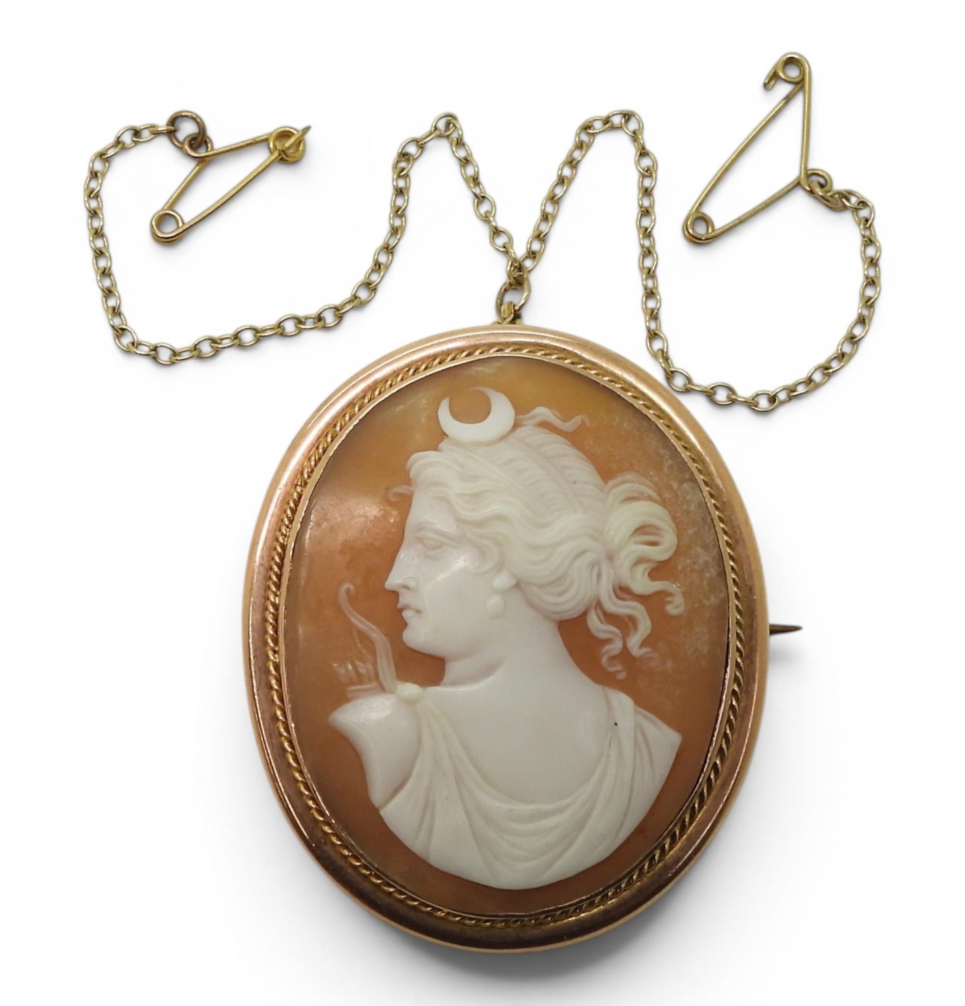 Shell cameo brooch of the Goddess Selene in profile, mounted in a 9ct gold frame