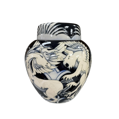 Vicky Lovatt for Moorcroft Dance of the Griffin limited edition ginger jar and cover with dark ground, gilt accents, and stylised griffin decoration