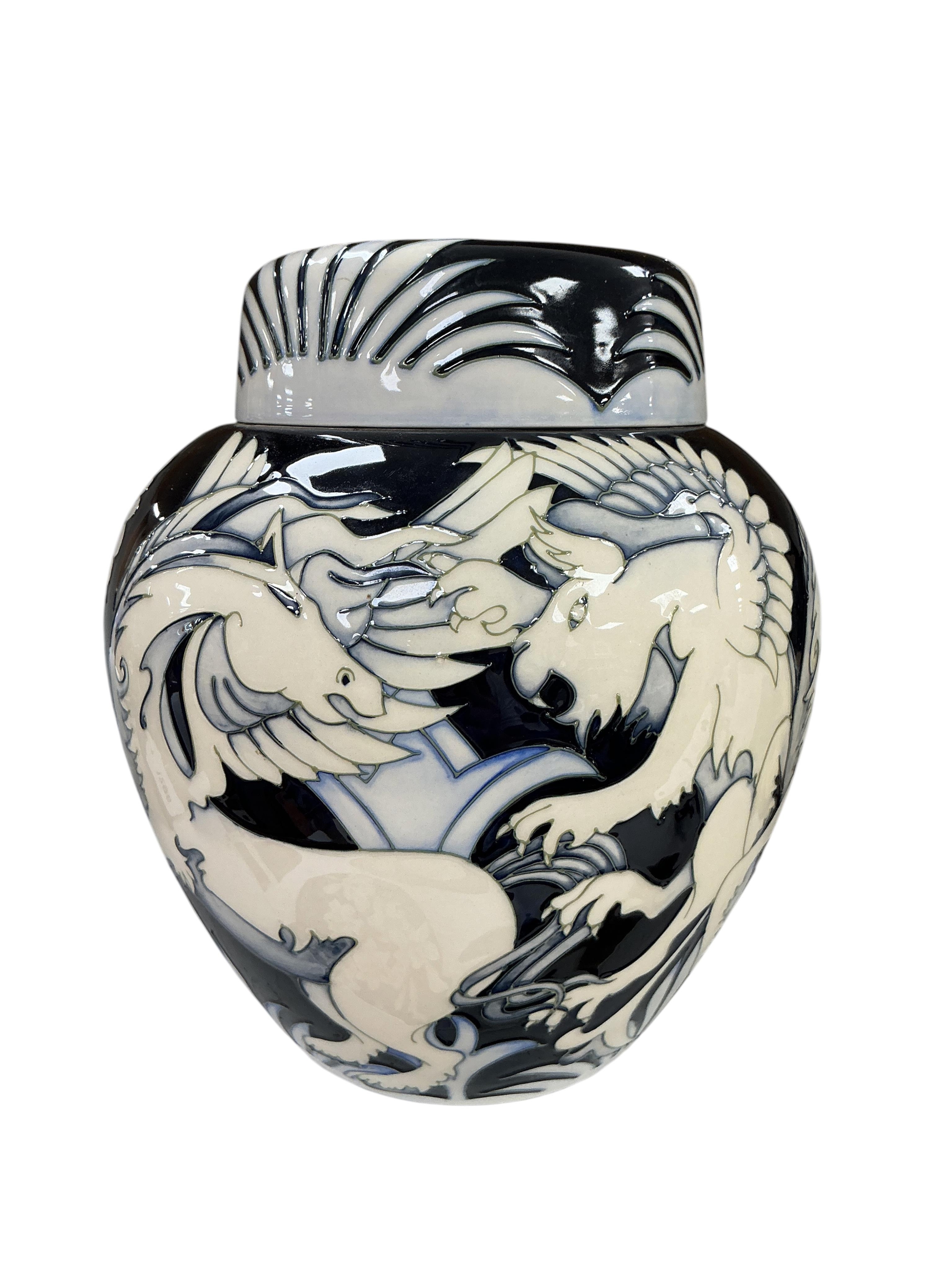 Vicky Lovatt for Moorcroft Dance of the Griffin limited edition ginger jar and cover with dark ground, gilt accents, and stylised griffin decoration