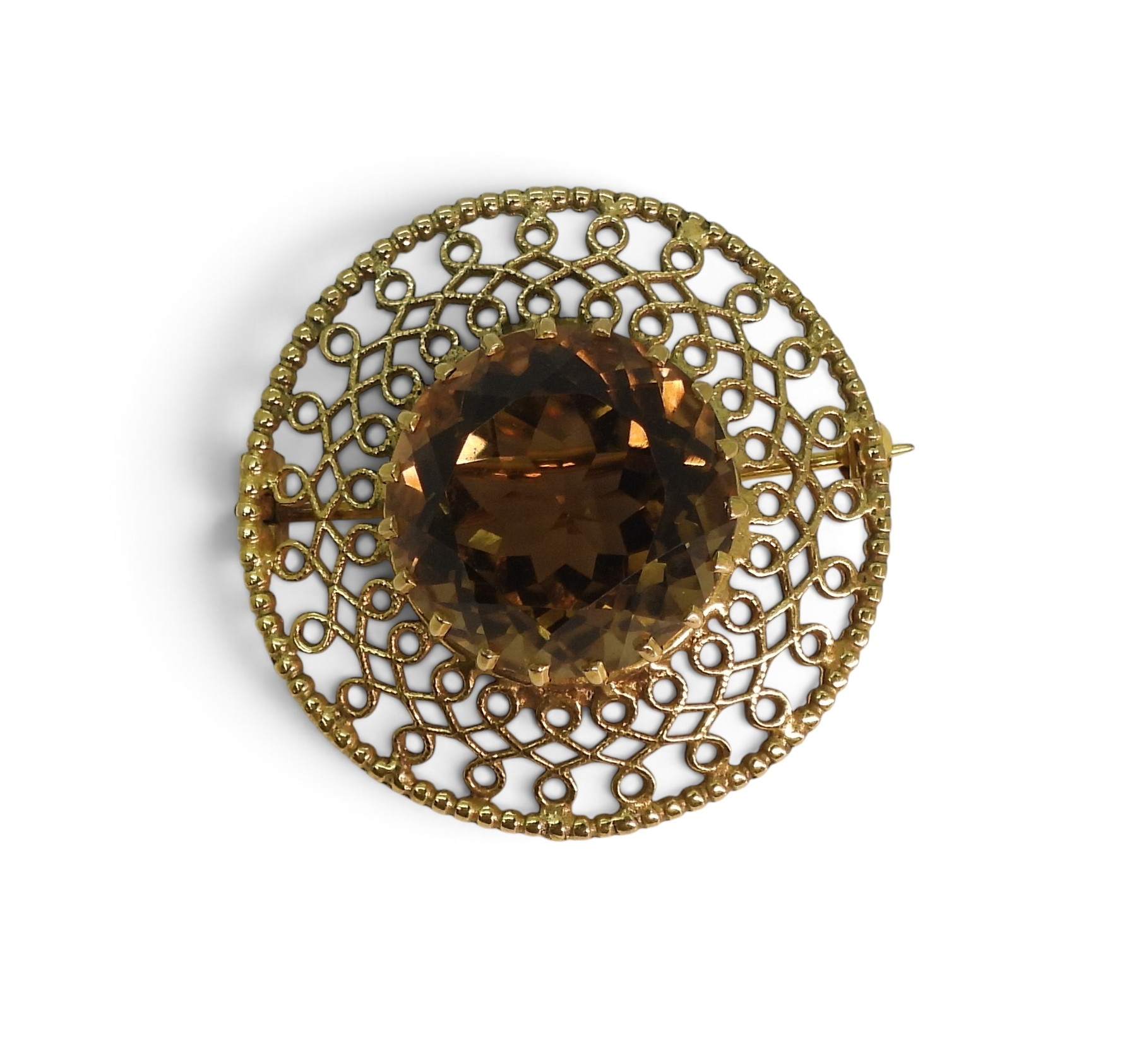 Circular 9ct gold filigree brooch by Robert Allison set with a large round smoky quartz